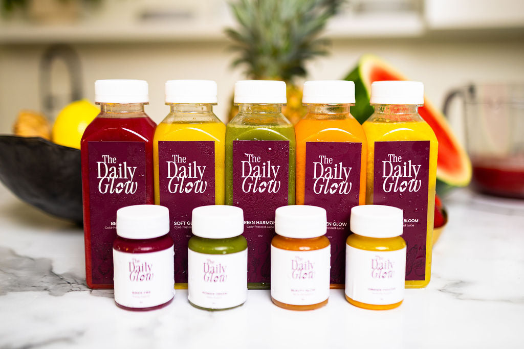 The full Daily Glow lineup, bottled the same morning it goes out